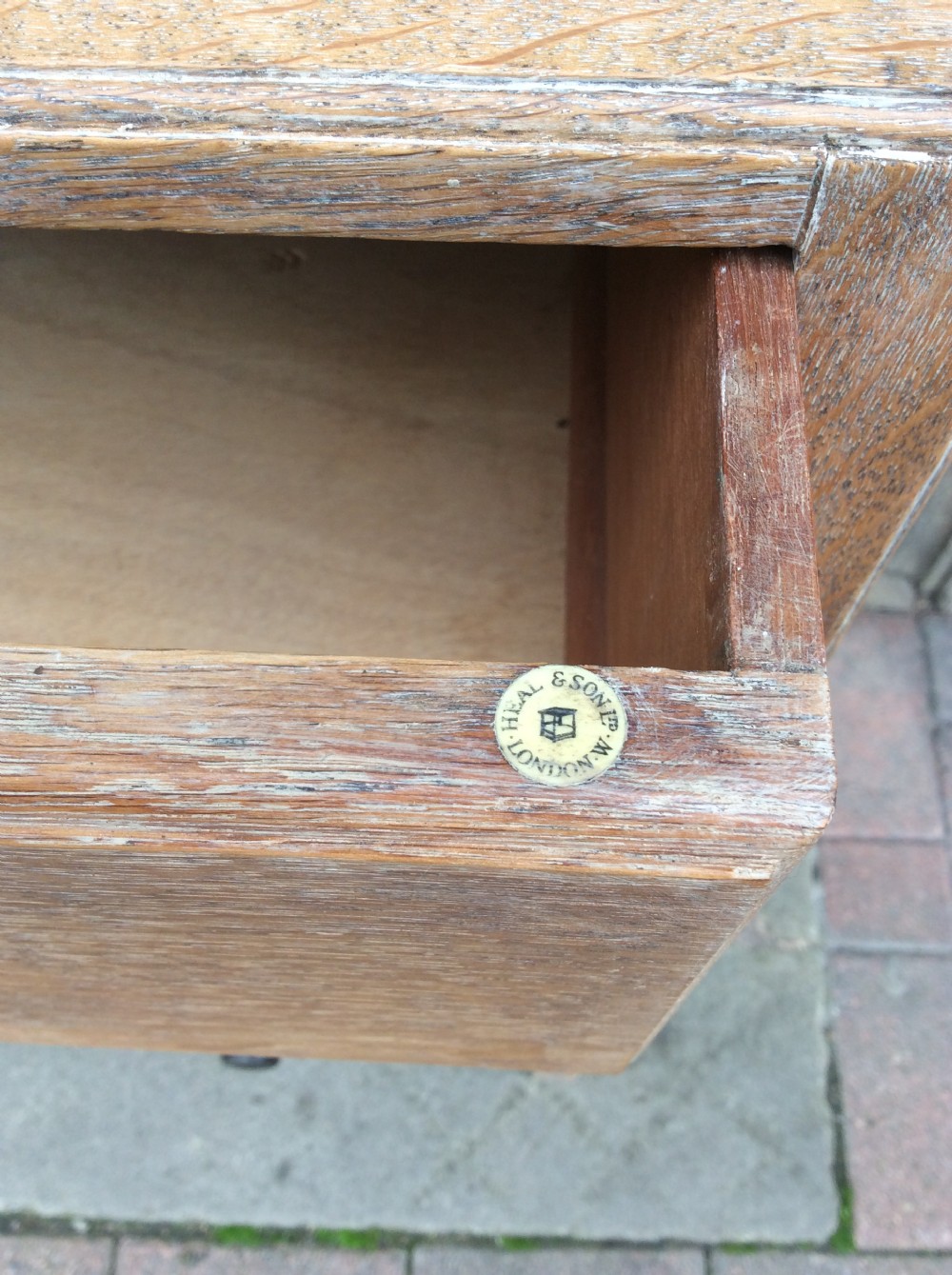 A 20thC pale oak Heals chest of drawers View IV