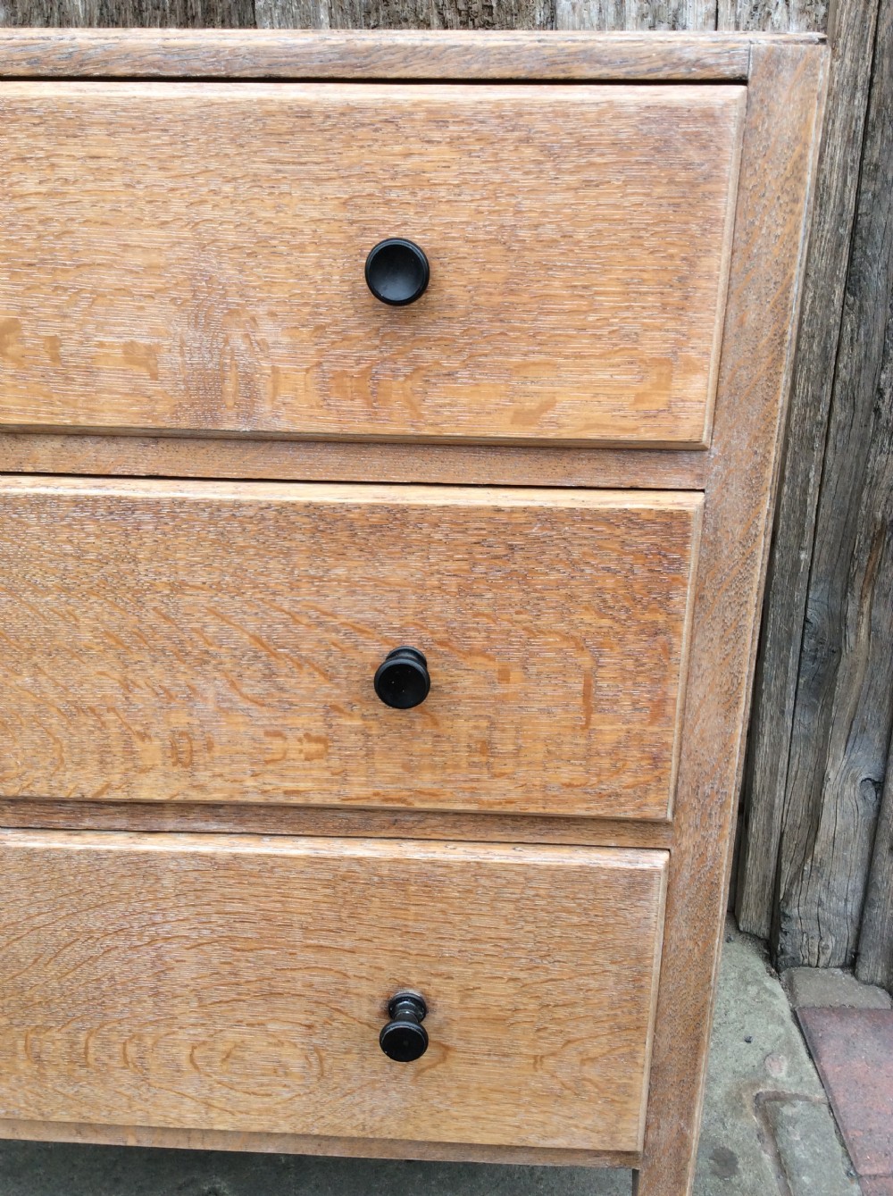 A 20thC pale oak Heals chest of drawers View V