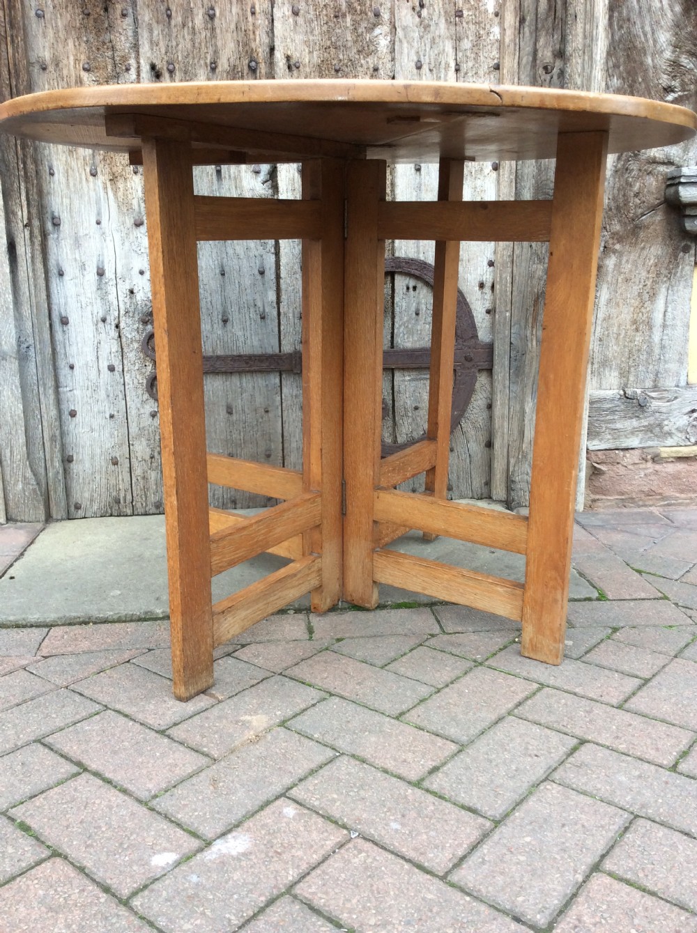 An early 20thC Arts & Craft light oak gateleg table View IV