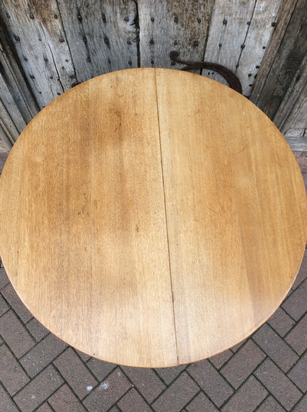 An early 20thC Arts & Craft light oak gateleg table View V