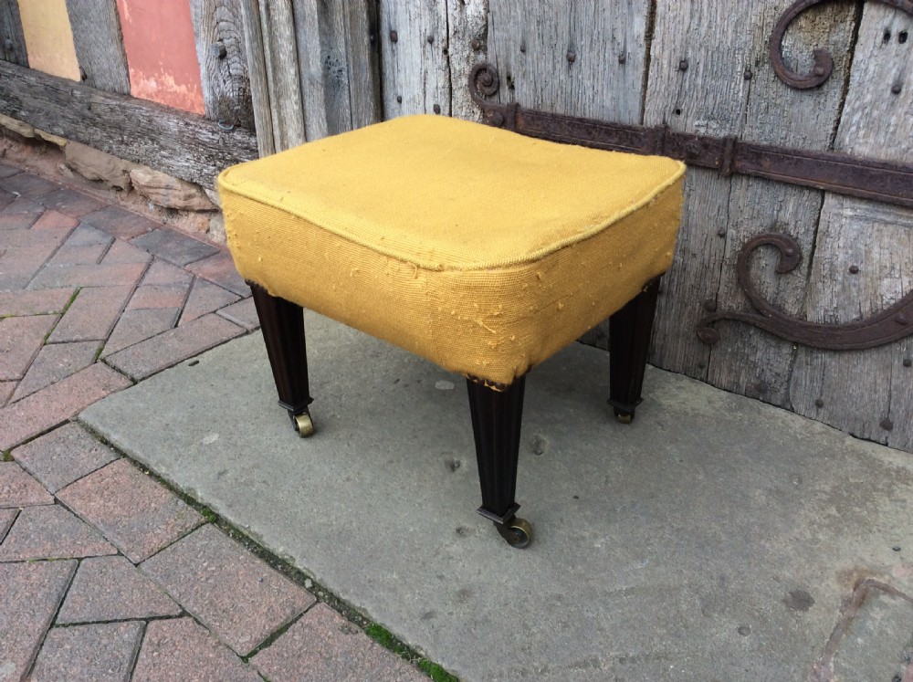 An Edwardian mahogany footstool View III