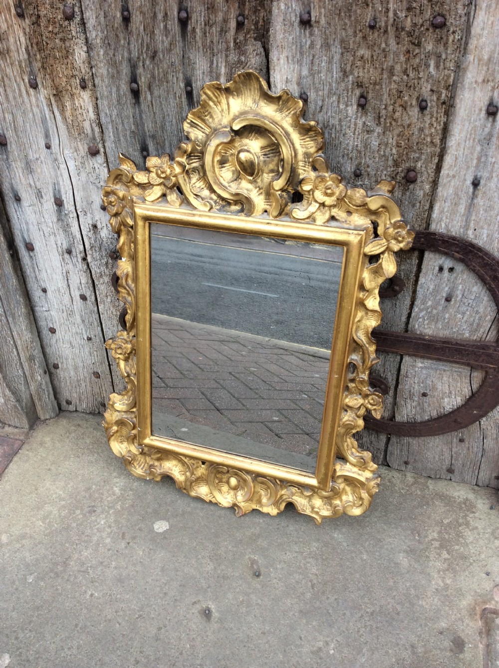 An 18thC Italian carved & gilded mirror View III