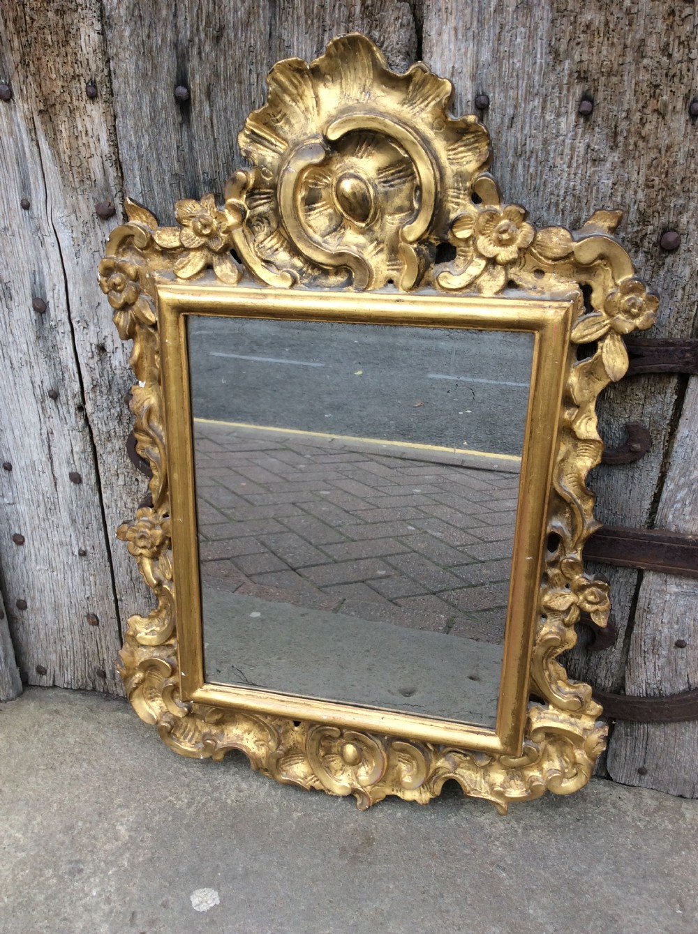 An 18thC Italian carved & gilded mirror View V