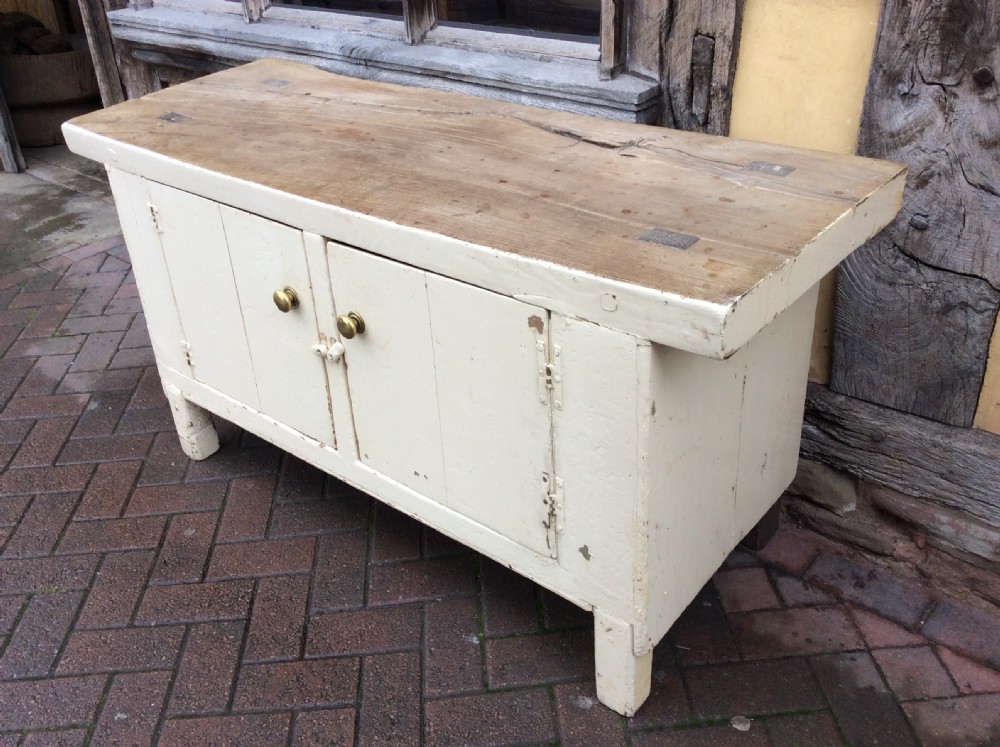 A 19thC painted pine and elm primitive cupboard View III