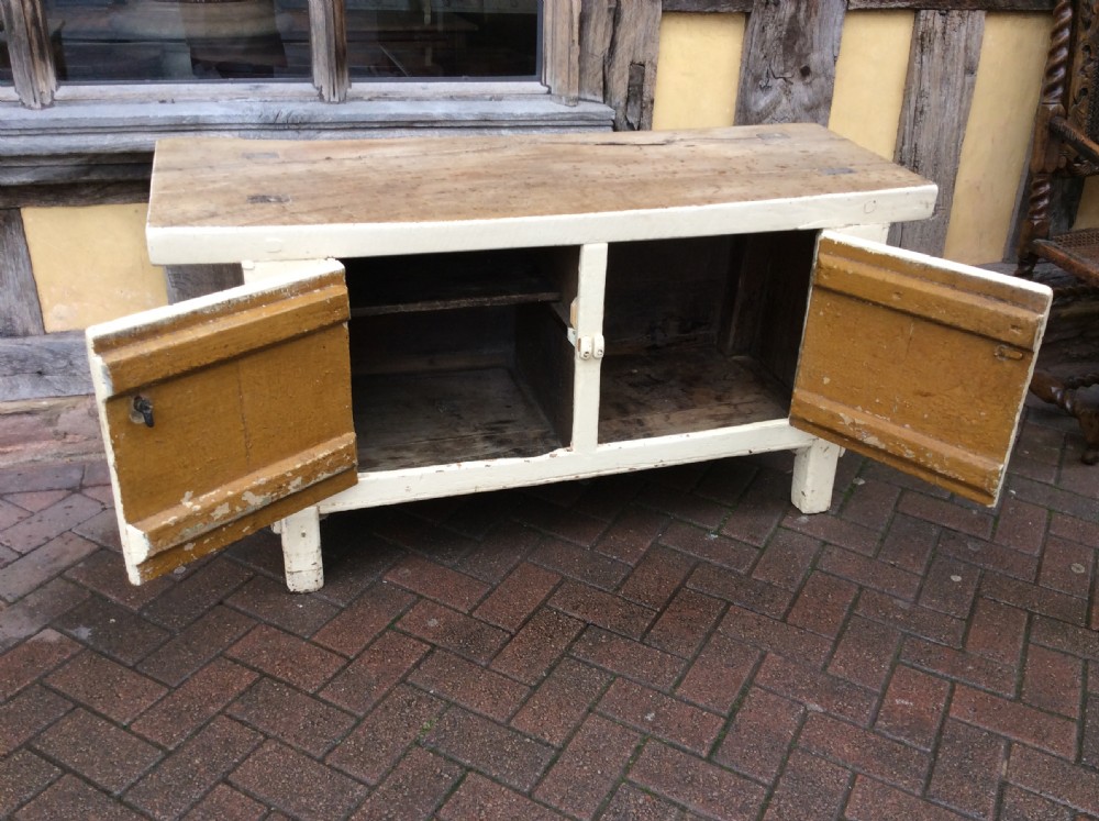 A 19thC painted pine and elm primitive cupboard View V