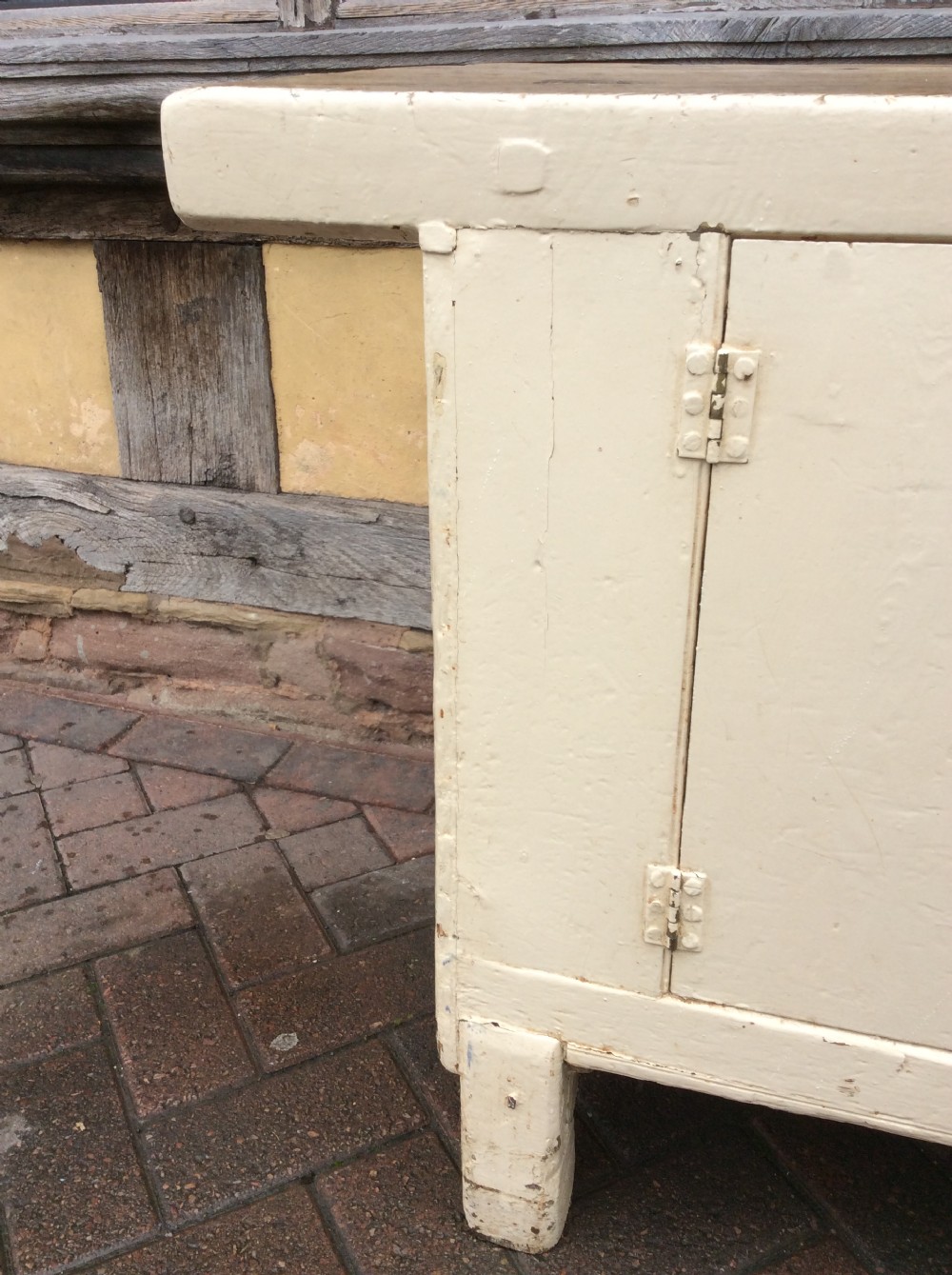 A 19thC painted pine and elm primitive cupboard View IX