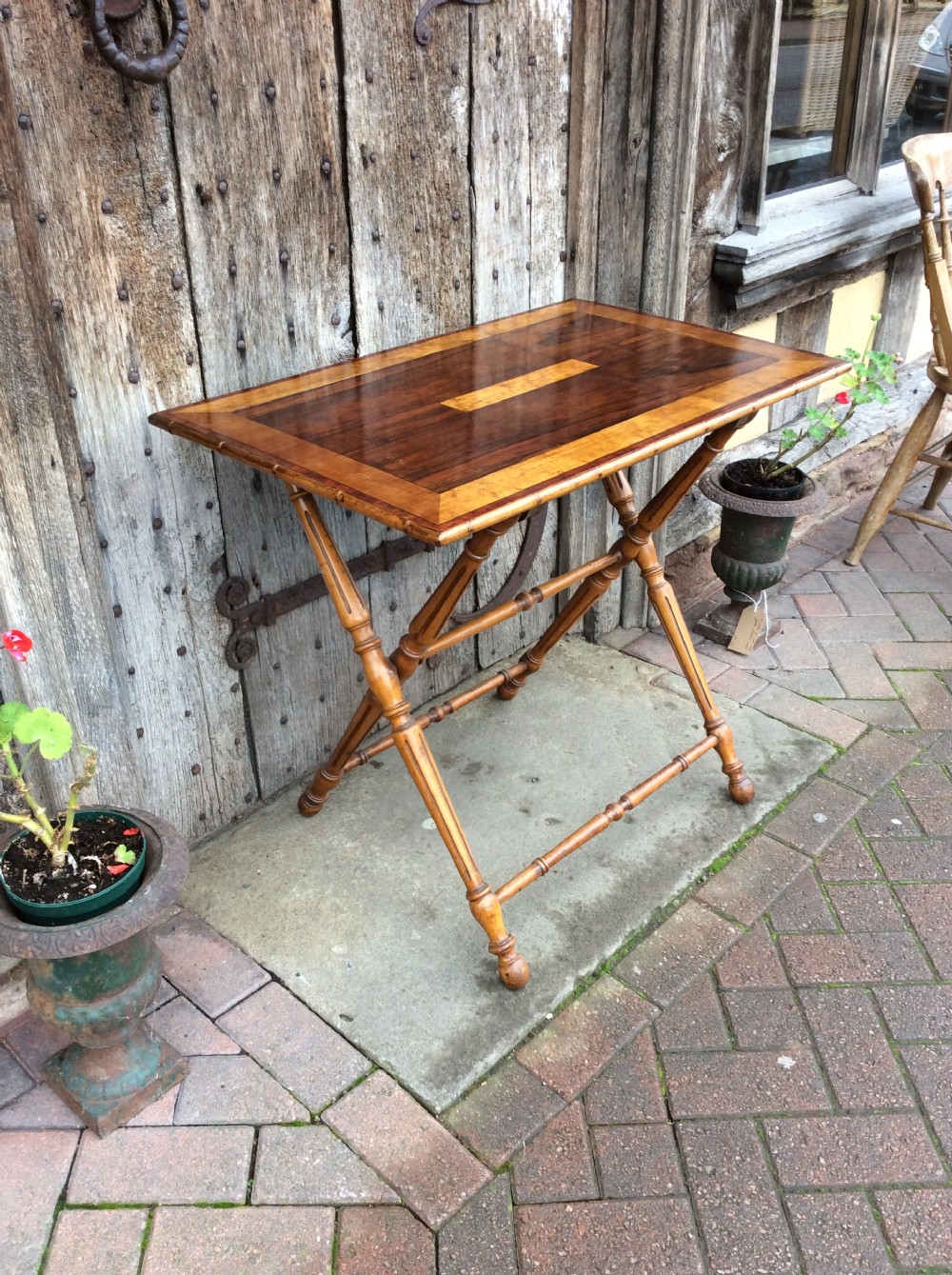 A 19thC Coaching table in rosewood and birds eye maple View II
