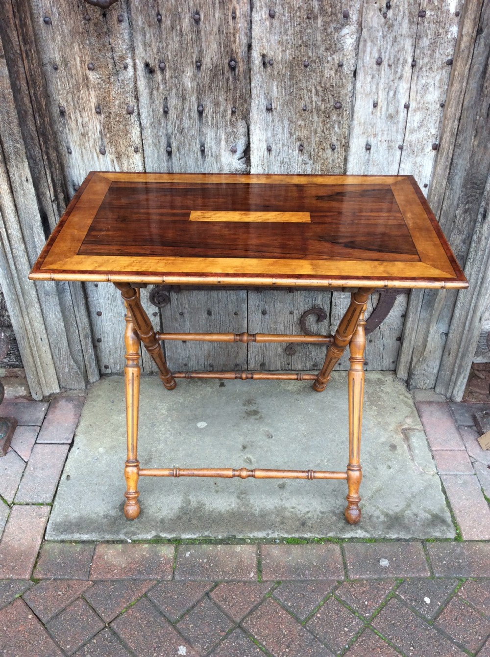 A 19thC Coaching table in rosewood and birds eye maple View III