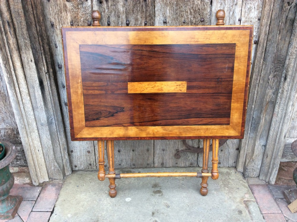 A 19thC Coaching table in rosewood and birds eye maple View VI