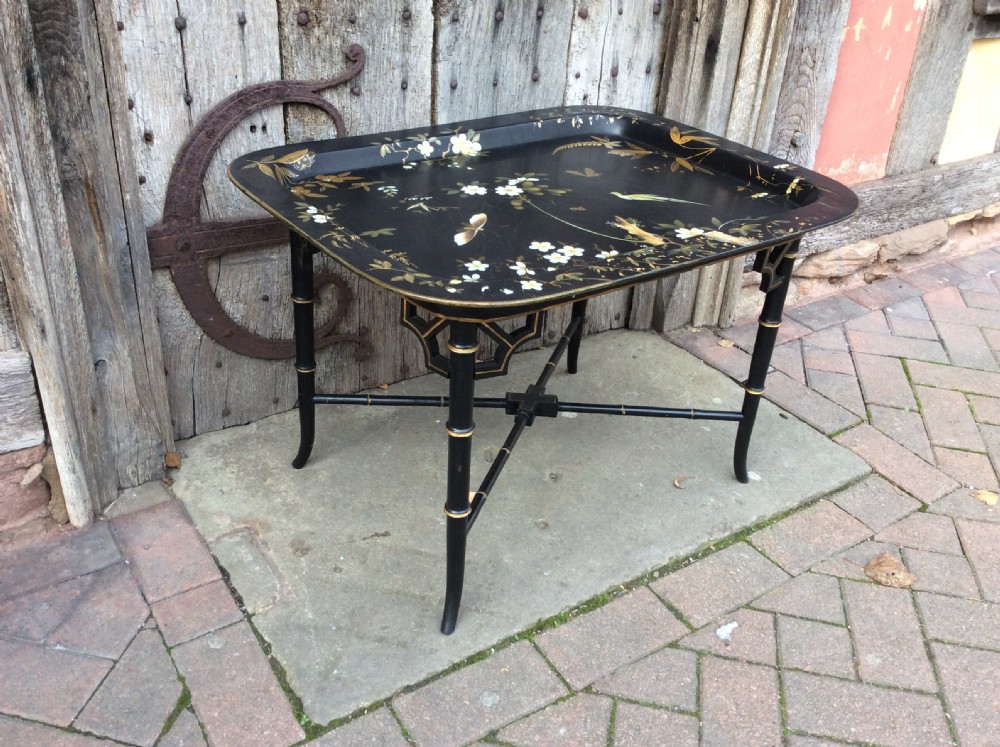 A 19thC papier mâché tray standing on later stand View III