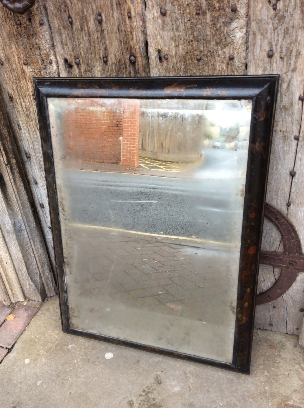 An 18thC black lacquered chinoiserie mirror View II