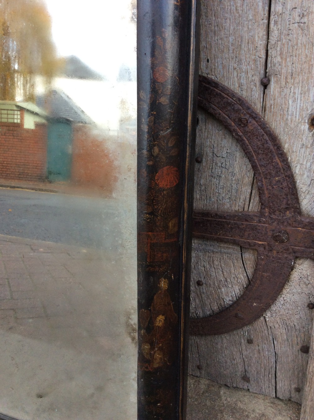 An 18thC black lacquered chinoiserie mirror View III