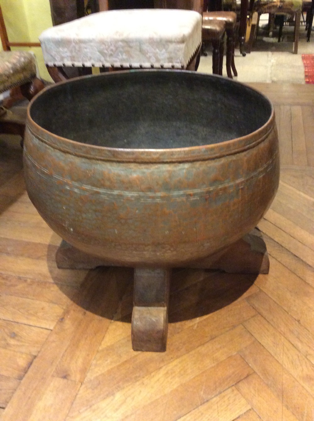 An Early 20thC beatten copper cauldron View II