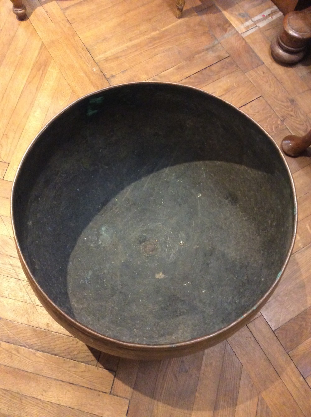 An Early 20thC beatten copper cauldron View III