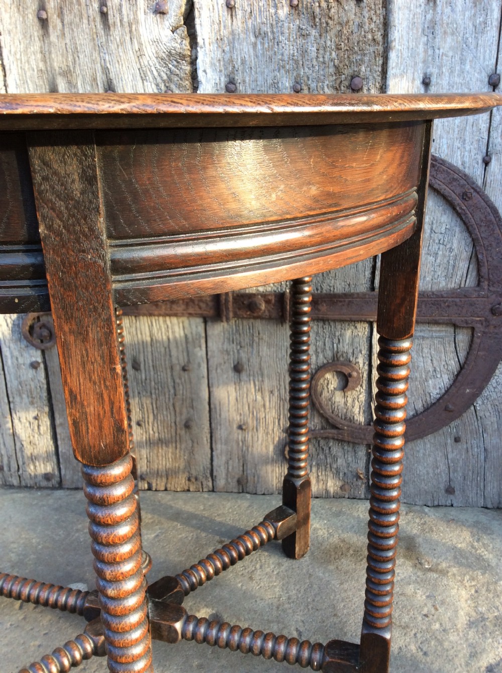 An Edwardian oak 6 legged lamp table View IV