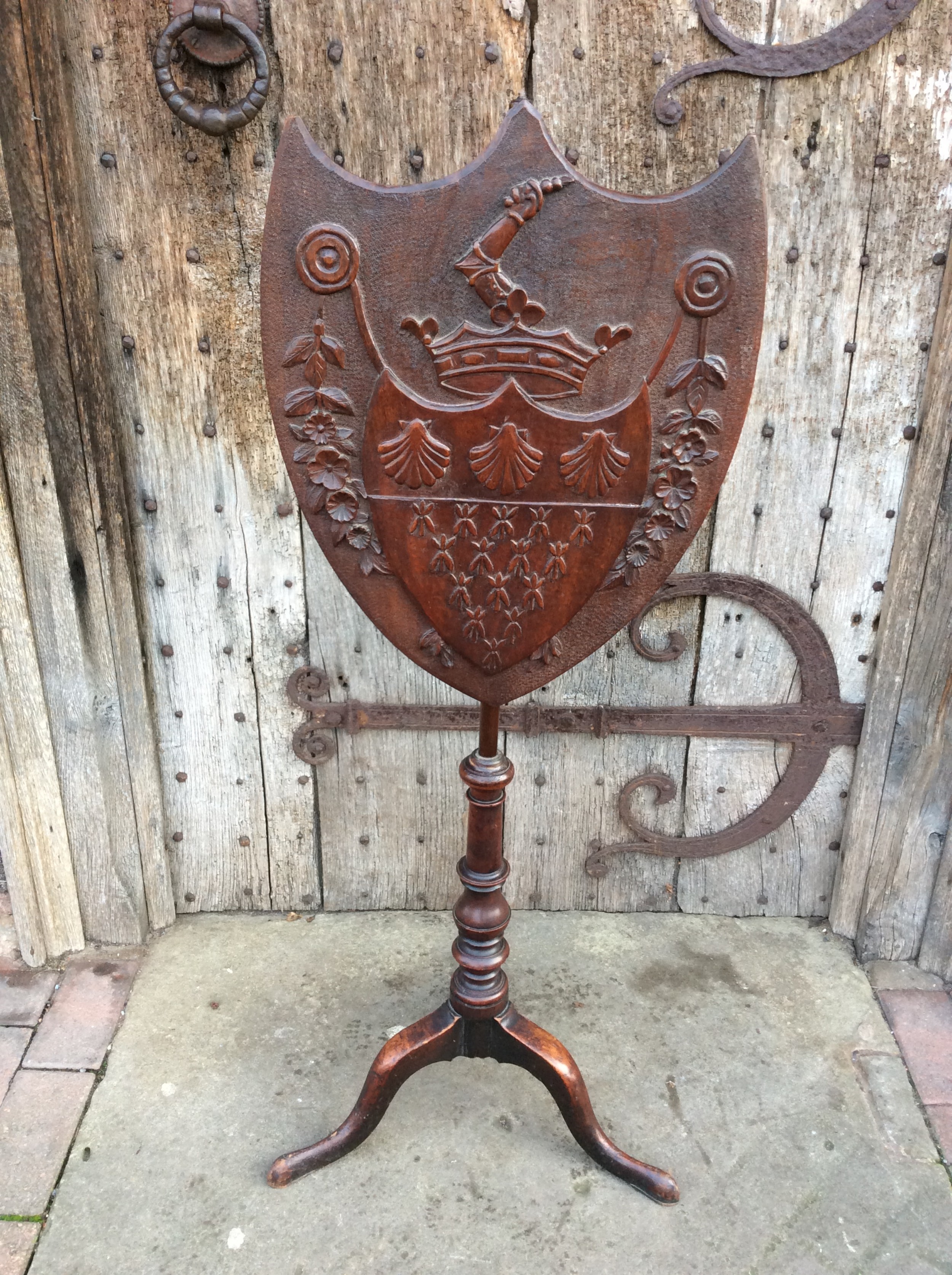 A 19thC carved shield screen coat of arms 