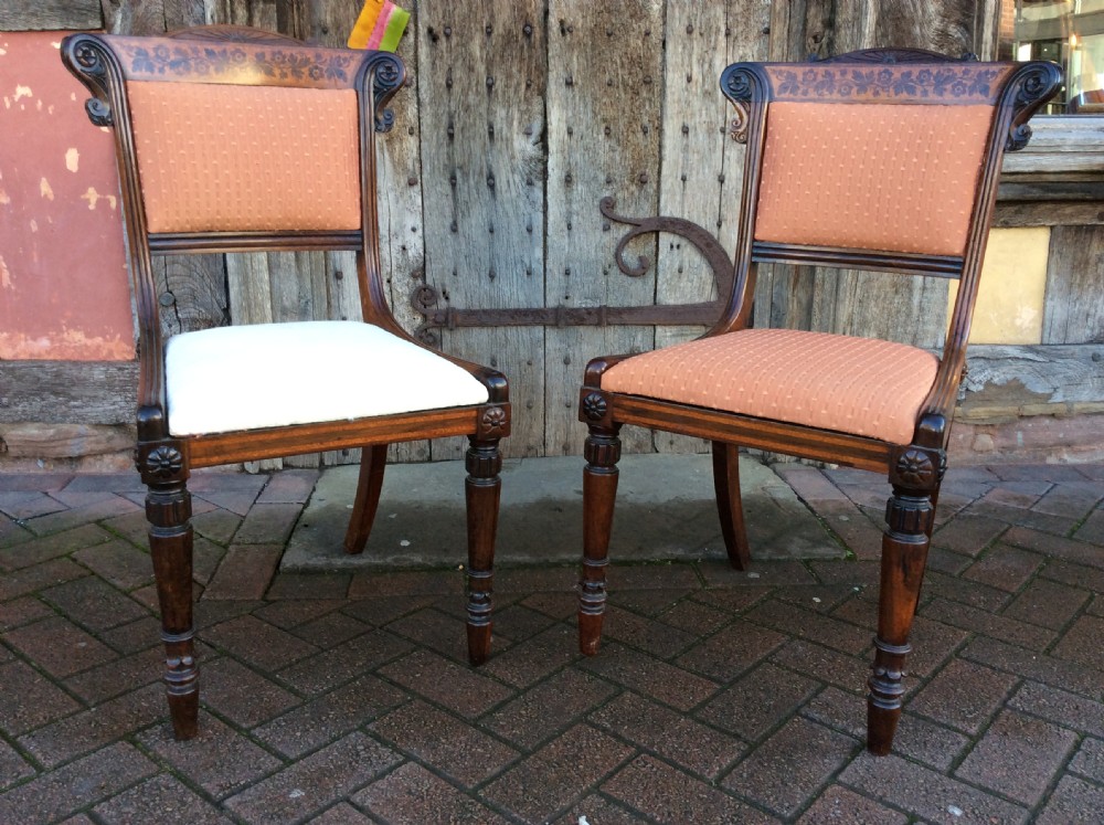 A pair of Regency rosewood & holly inlaid chairs attributed to George Bullock View II