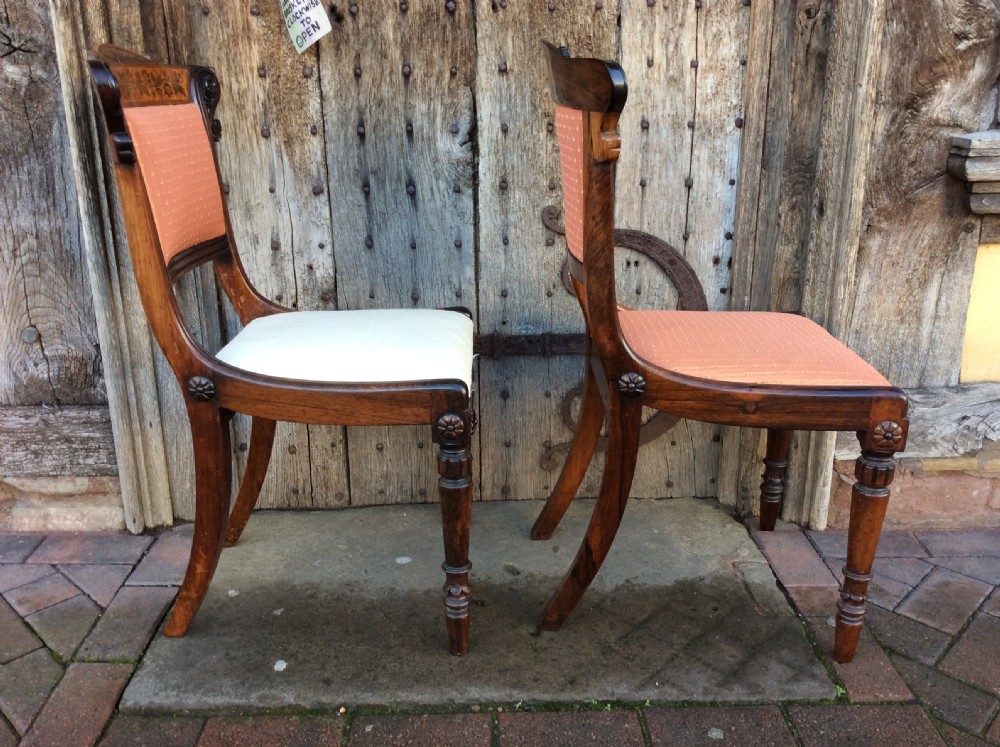 A pair of Regency rosewood & holly inlaid chairs attributed to George Bullock View VI