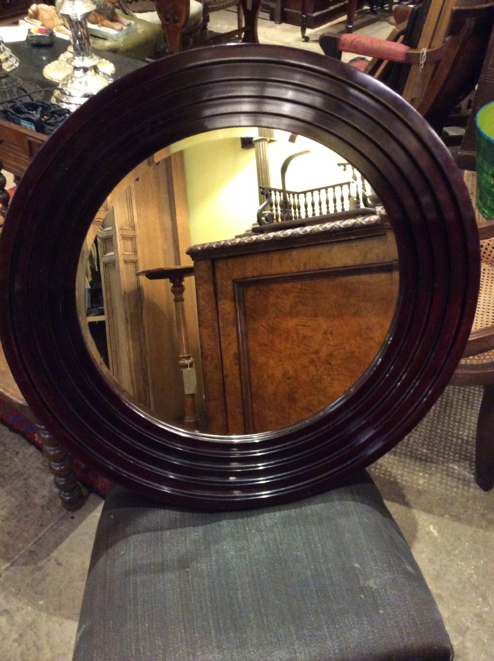 An Art Deco lacquered circular mirror View II