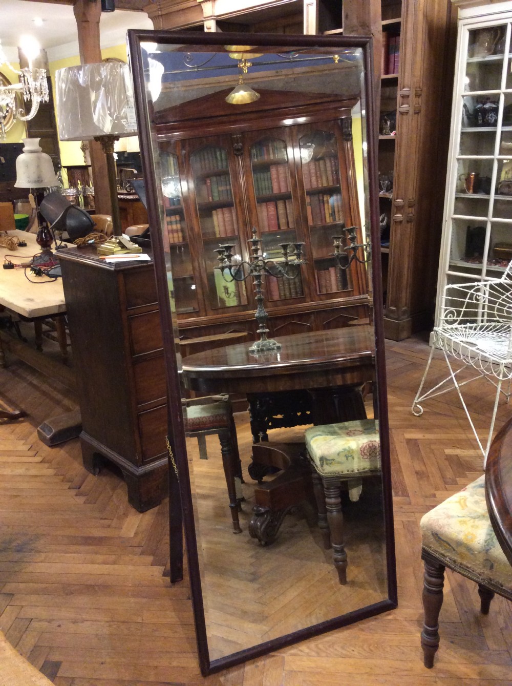 A free standing mahogany mirror  View III