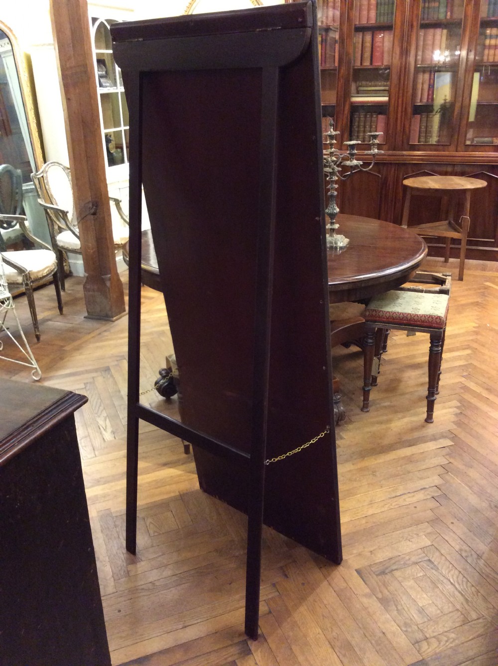 A free standing mahogany mirror  View V