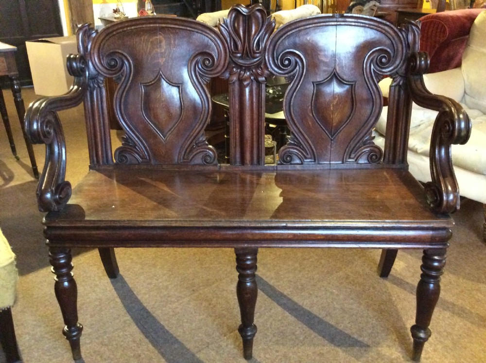 A 19thC carved oak bench View XI