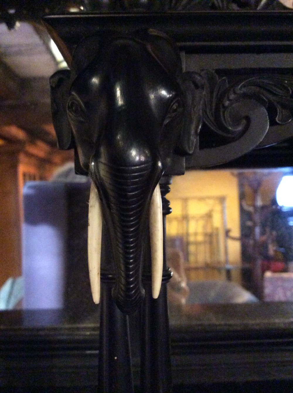 A 19thC Ceylonese ebony mirrored set of wall shelves View V