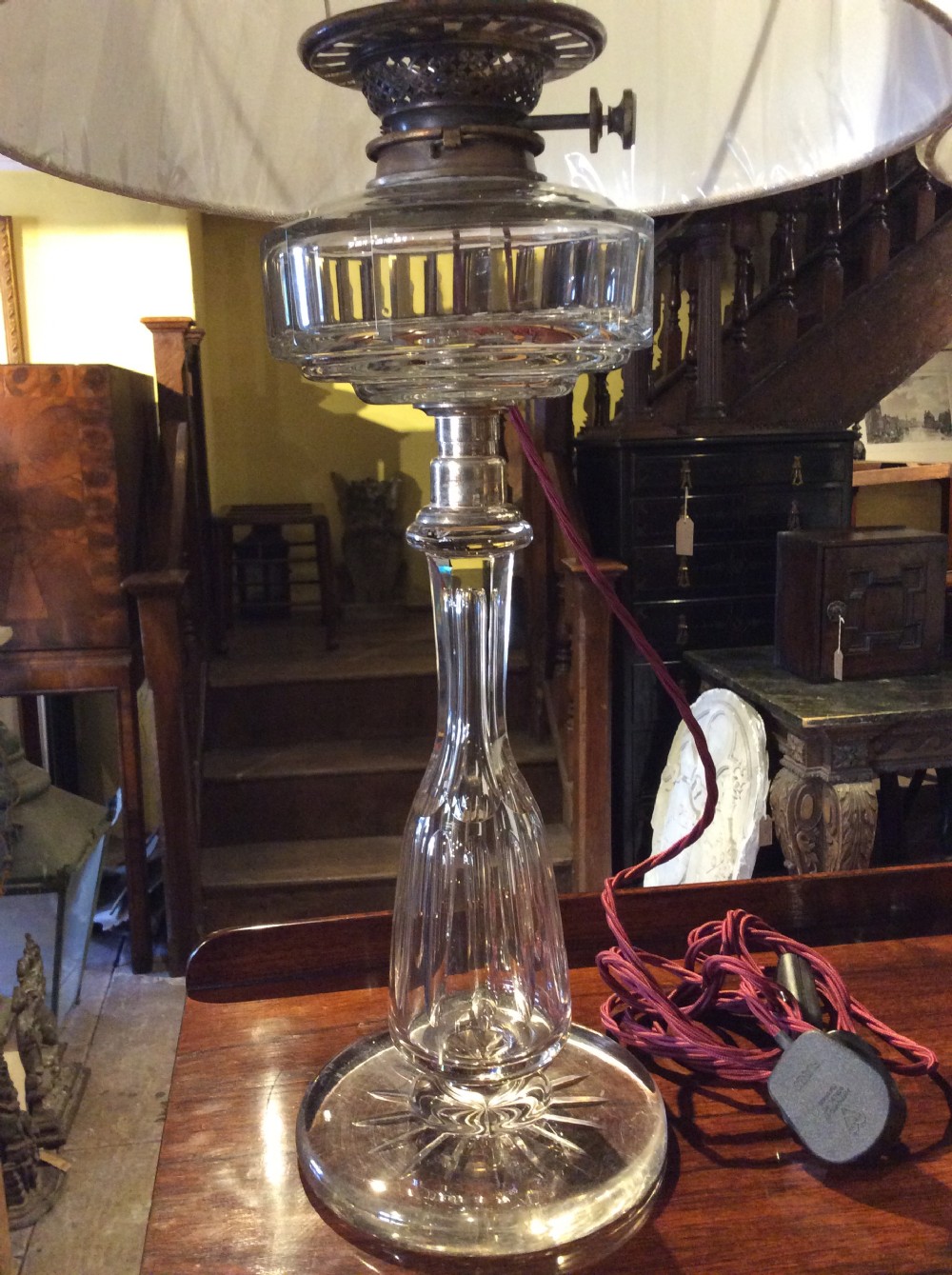 A pair of 19thC cut glass & plated silver table lamps View II
