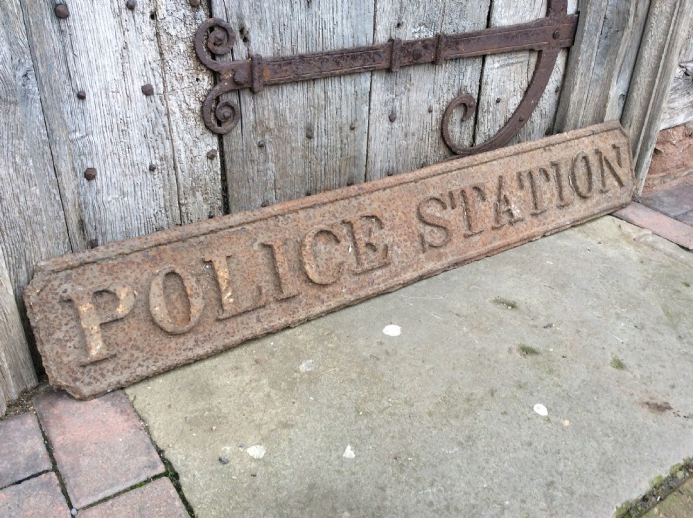 A 19thC “ Police station” sign in cast pig iron View II