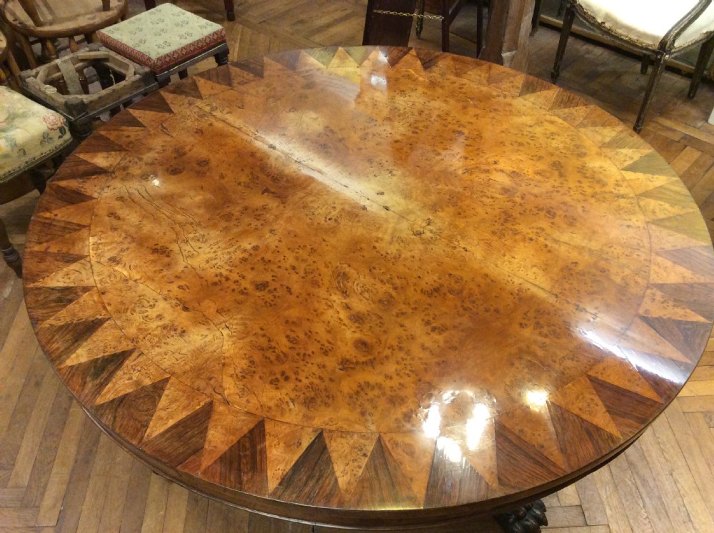 A 19thC burr oak and rosewood circular table View VI