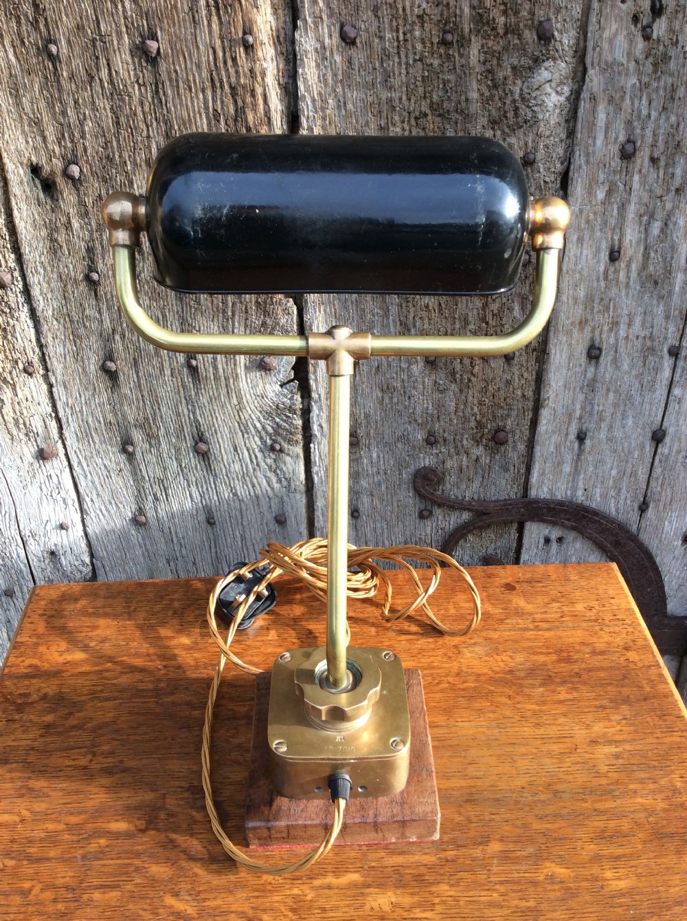 An early 20thC heavy quality brass table lamp View V