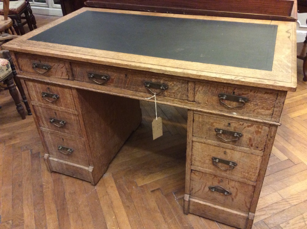 A 19thC oak 3 part pedestal desk View V