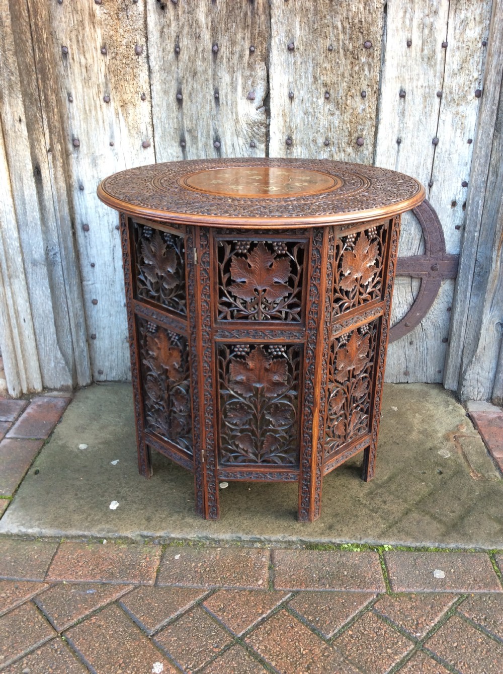 A  brass inlay Moorish folding table View X