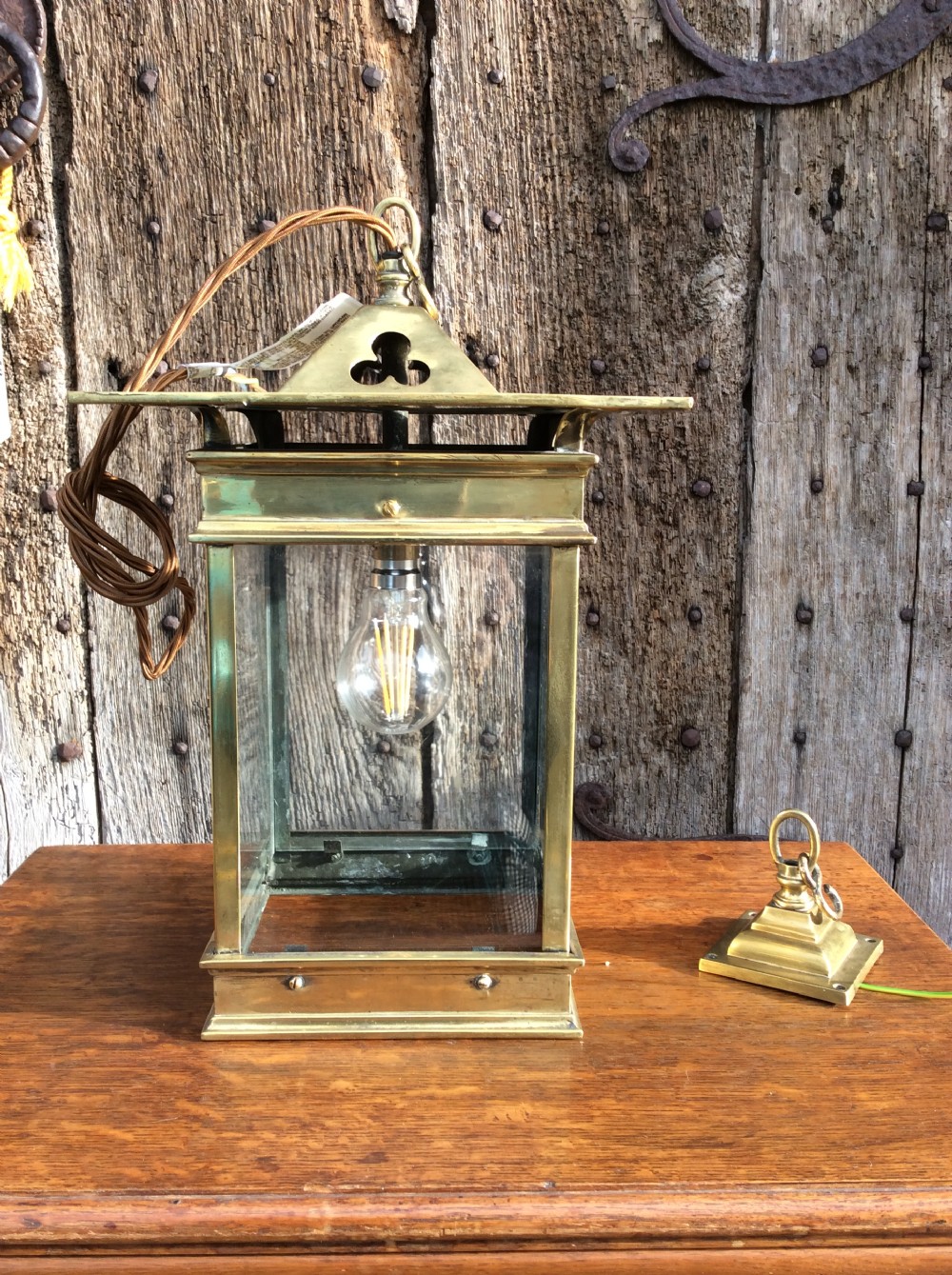 An Arts and Craft brass lantern