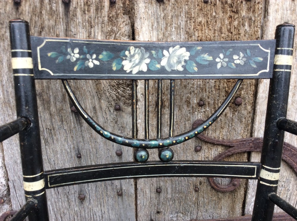 A Regency ebonised and decorated rush seated chair View VII