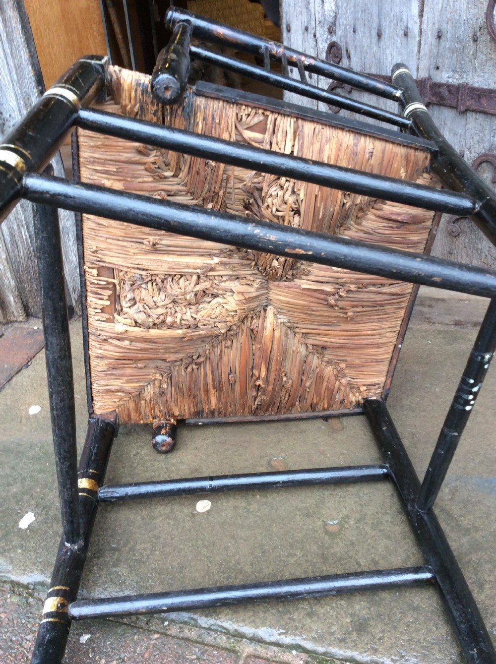 A Regency ebonised and decorated rush seated chair View IX