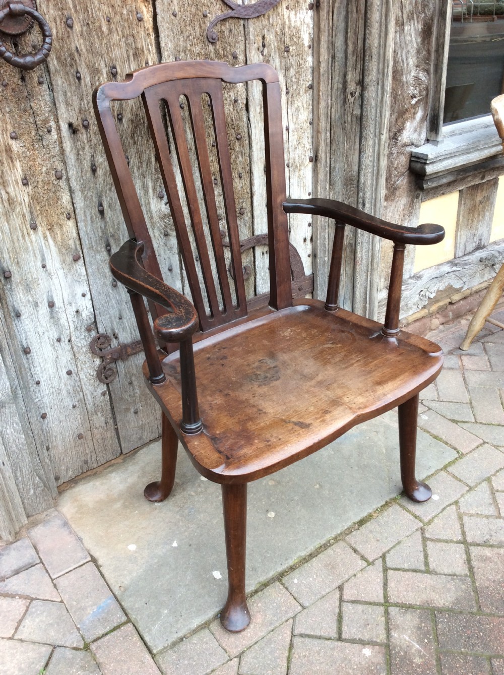 A 19thC Mahogany broad seated open armchair on pad feet View III