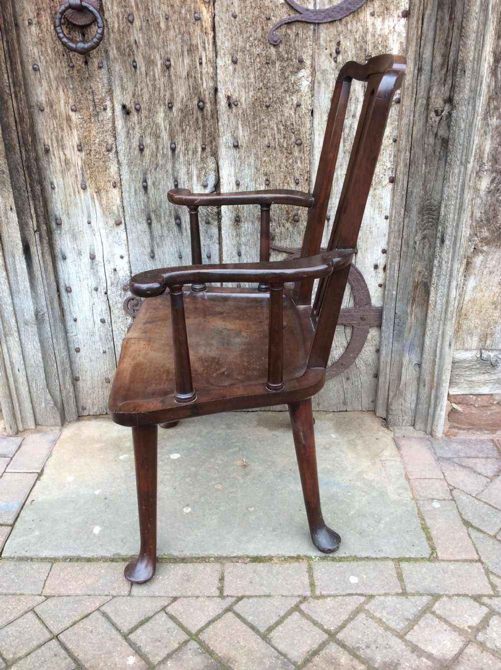 A 19thC Mahogany broad seated open armchair on pad feet View VII