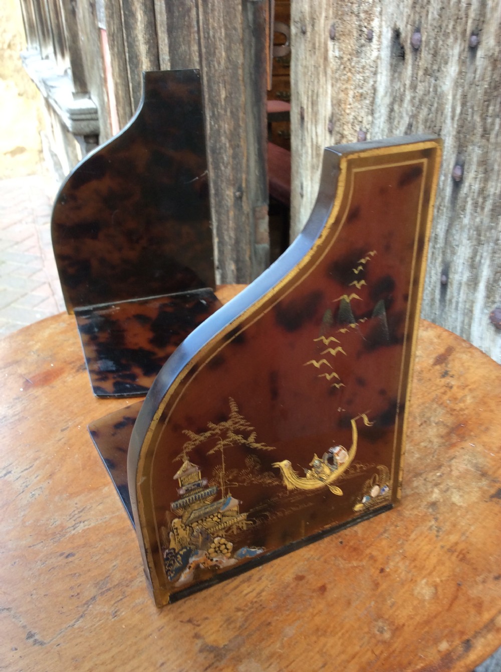 A pair of 1920’s faux tortoise shell bookends  View V