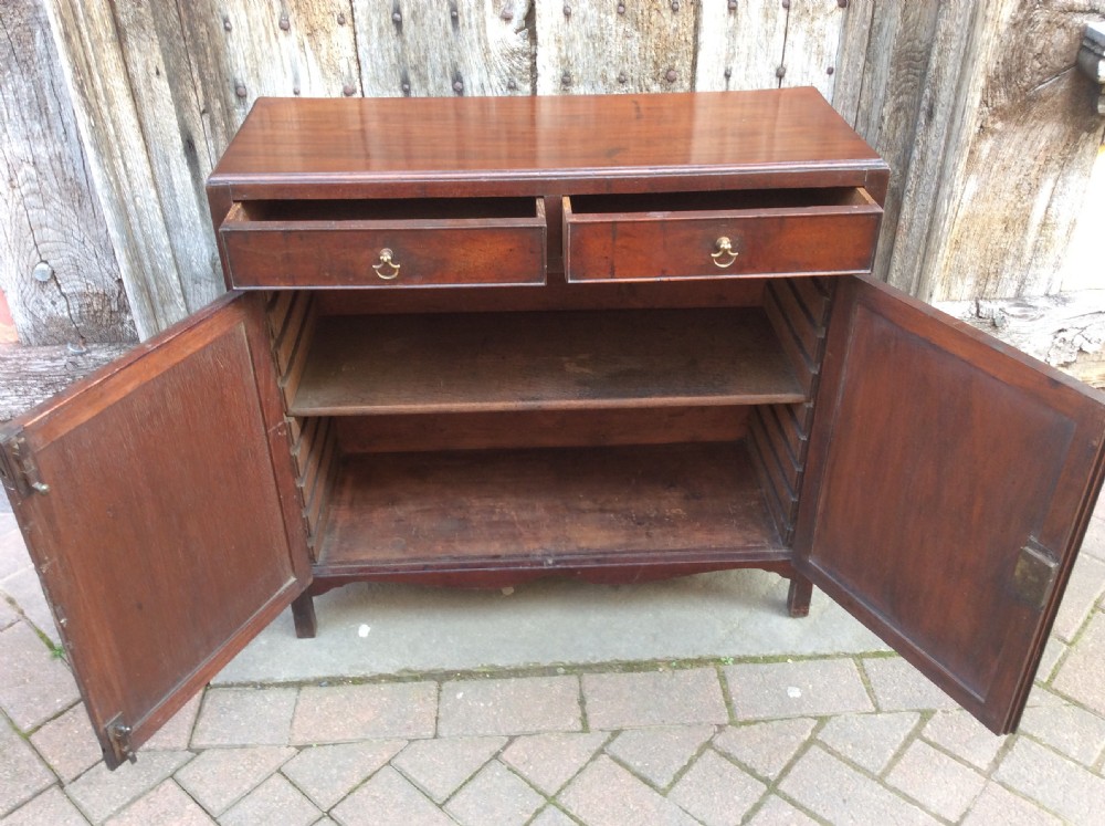 A small 18thC mahogany side cabinet View V