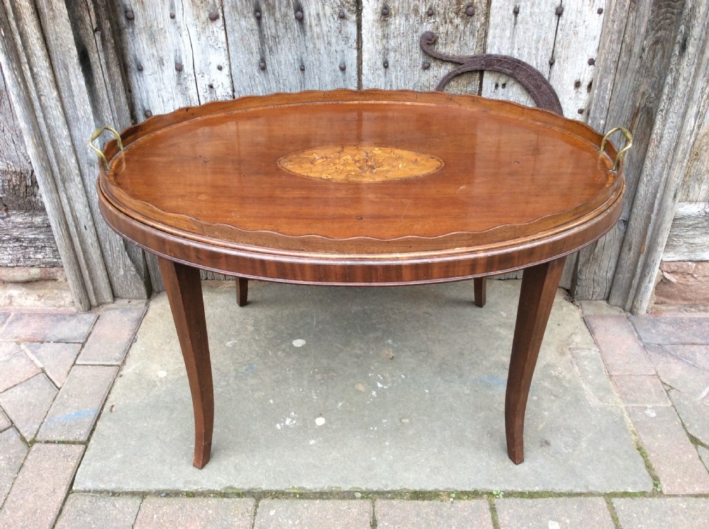 An 18thC mahogany oval tray on later stand View II