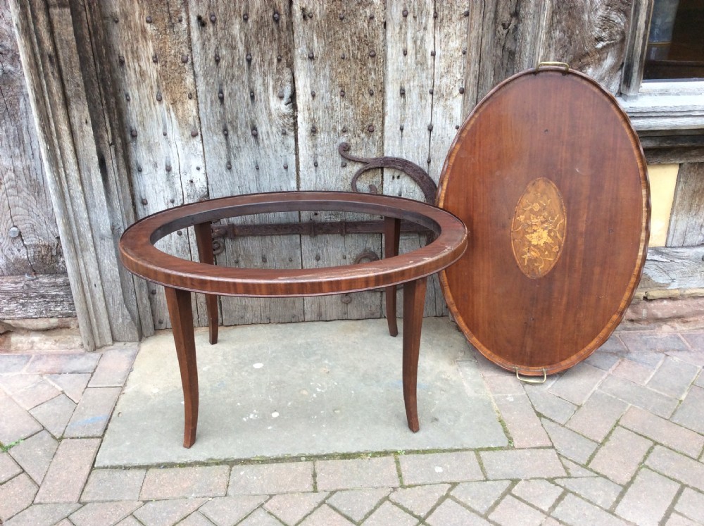 An 18thC mahogany oval tray on later stand View VII