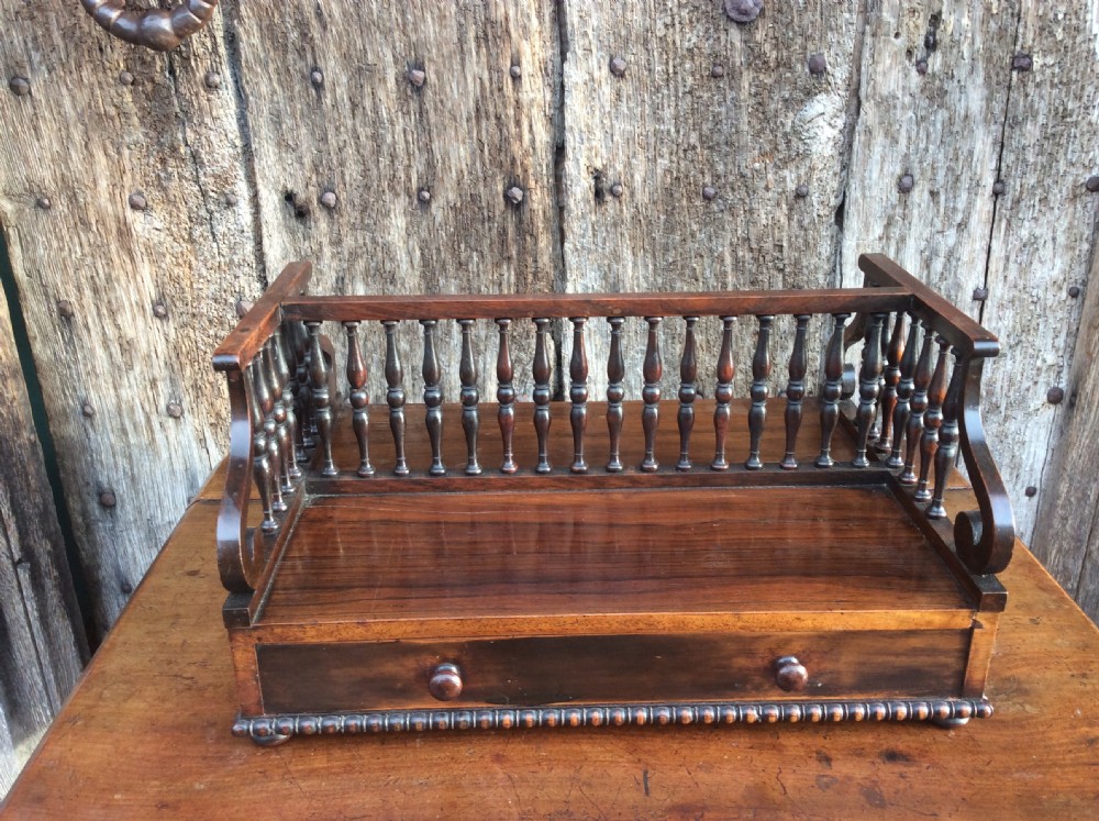 A Regency rosewood book holder