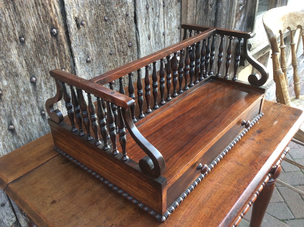 A Regency rosewood book holder View II