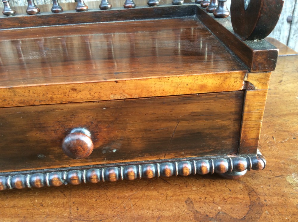 A Regency rosewood book holder View VIII