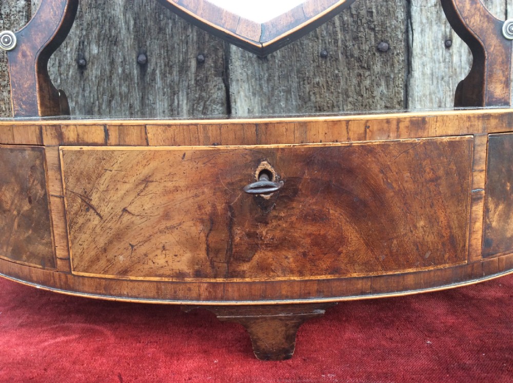 A late 18thC mahogany demi-lune table mirror View IV