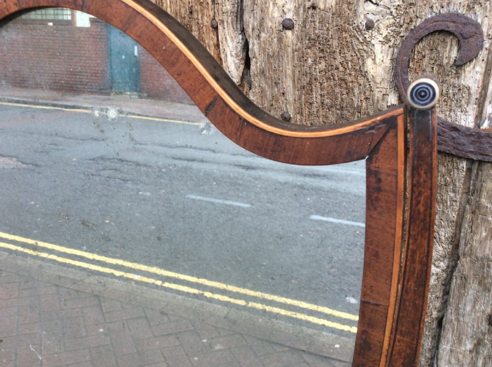 A late 18thC mahogany demi-lune table mirror View V