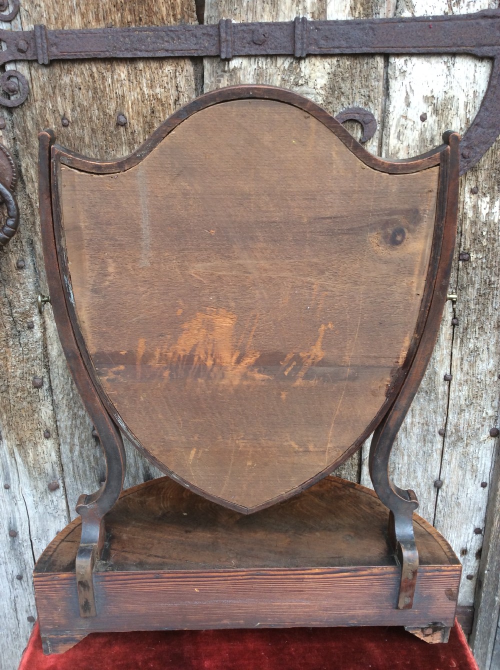 A late 18thC mahogany demi-lune table mirror View VI