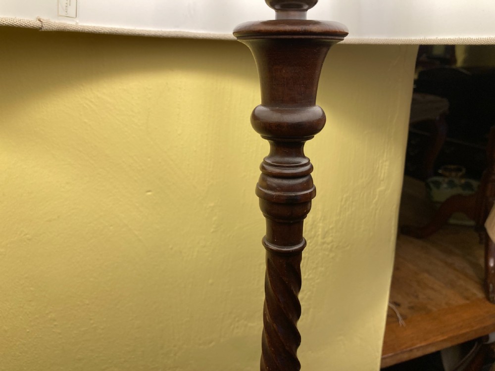 A pair of 19th century tall, fine quality, turned mahogany table lamps View IV