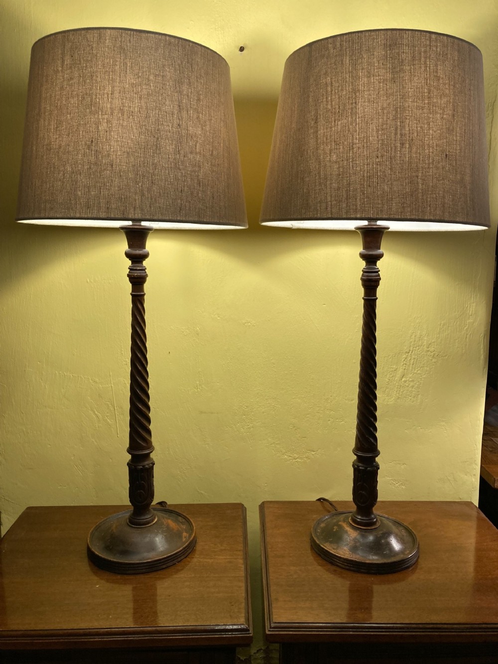 A pair of 19th century tall, fine quality, turned mahogany table lamps